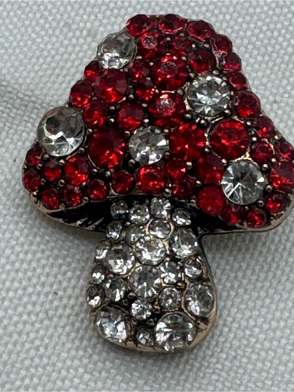 mushroom brooch, red and clear crystals, cap clear stem approx 1”
